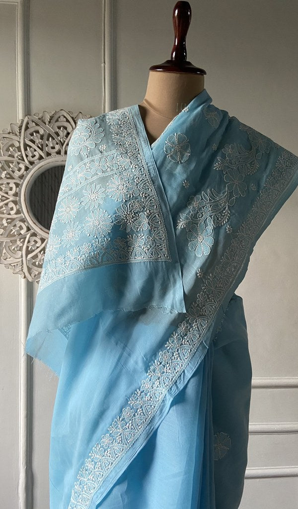 Border detail on the powder blue cotton voile saree