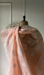 Load image into Gallery viewer, Body of the peach saree, chikankari across the ground