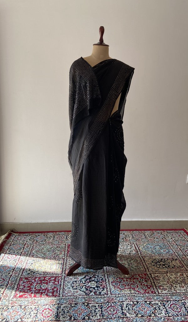 Black pure organza silk saree draped on the mannequin