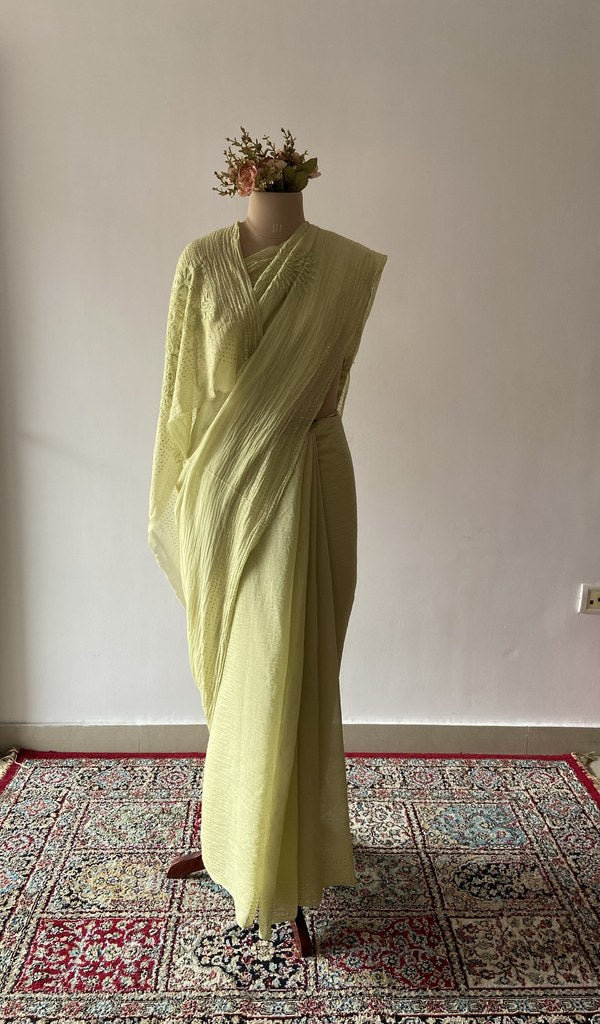 Green pure mul chanderi saree draped on the mannequin