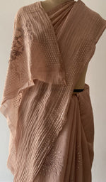 Close on the body of the saree