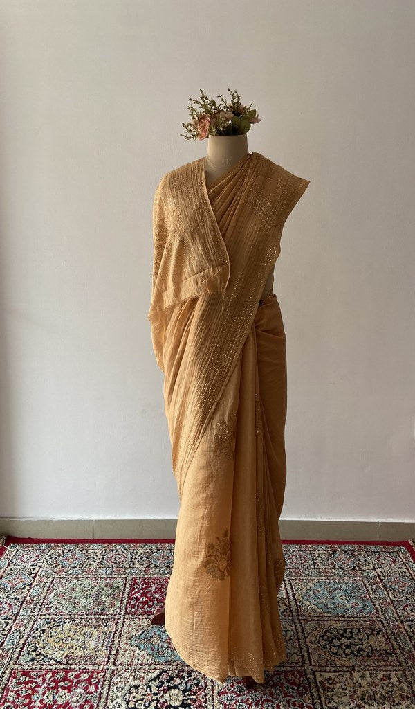 Yellow pure mul chanderi saree draped on the mannequin