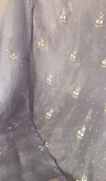 The kurta piece folded on the carpet