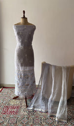 The set on the mannequin with its dupatta beside it