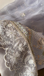 Resham thread through the motifs