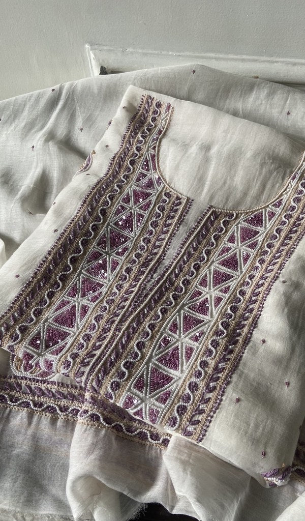 off white pure mul chanderi chikankari suit set, folded