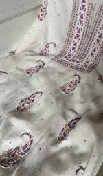 close view of the fine coloured chikankari with unique motifs