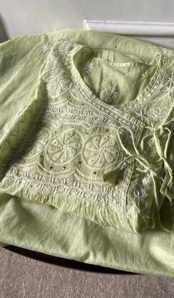 green pure mul chanderi chikankari suit set, folded