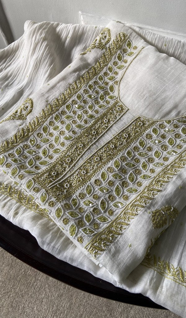 off white pure mul chanderi chikankari suit set, folded
