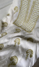 close view of the fine coloured chikankari with unique motifs