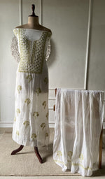 off white pure mul chanderi chikankari set on the mannequin with the dupatta
