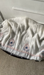 fabric laid out, off white pure mul chanderi