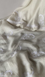 The kurta piece folded on the carpet