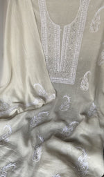 Beads and cutdana along the placket