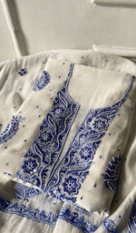off white pure mul chanderi kurta piece folded, fine shaded blue coloured chikankari with matching beads