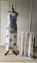 The set on the mannequin with its dupatta beside it