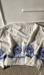Bottom fabric draped over the stool