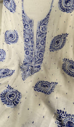 fine shaded blue coloured chikankari with matching beads across the body of the kurta