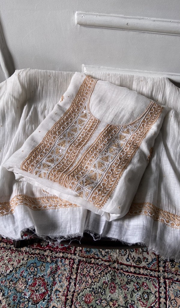 white pure mul chanderi chikankari 2 pc unstitched suit set, folded