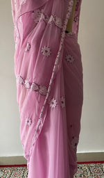 Fine chikankari on border and pallu across the pallu