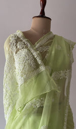 The pallu falling over the shoulder
