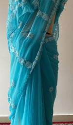 Fine chikankari on border and pallu across the pallu