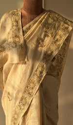 Golden beige mul chanderi saree draped on the mannequin, front view