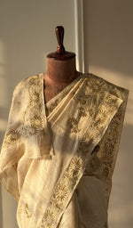 Fine chikankari on border and palla on the golden beige saree