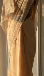 Golden beige saree on the mannequin, close view