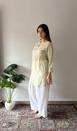 Fine chikankari across the yoke