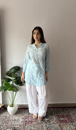 Neckline and placket in close up