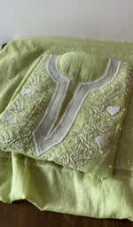 Lime Green pure mul chanderi kurta piece folded, fine chikankari in view