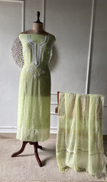 Lime Green suit set on the mannequin with its dupatta