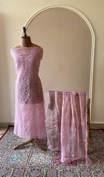 Mauve pink organza silk set on the mannequin with its dupatta