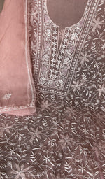 Dusty pink organza silk laid out flat