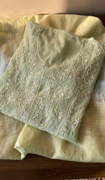 Folded sage green mul chanderi kurta, front view