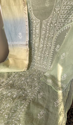 Sage green mul chanderi laid out flat