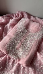 Pink pure mul chanderi kurta piece folded, fine do taar chikankari on gala and boota of kurta