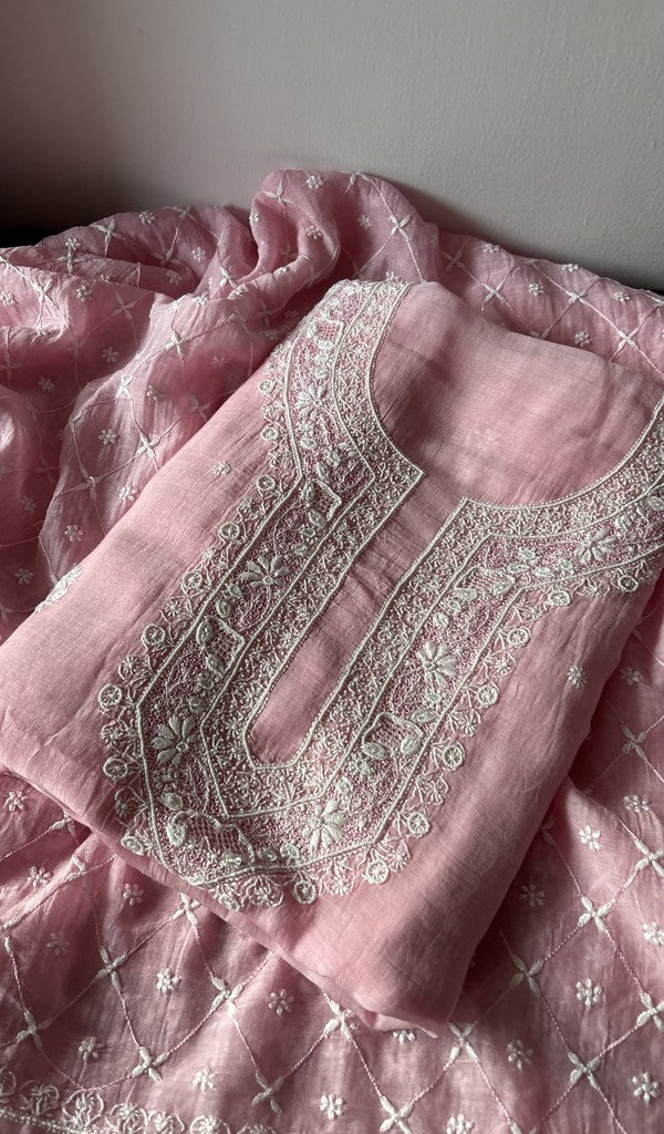 Pink pure mul chanderi kurta piece folded, fine do taar chikankari on gala and boota of kurta