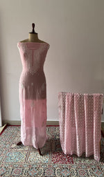 The set on the mannequin with its dupatta beside it
