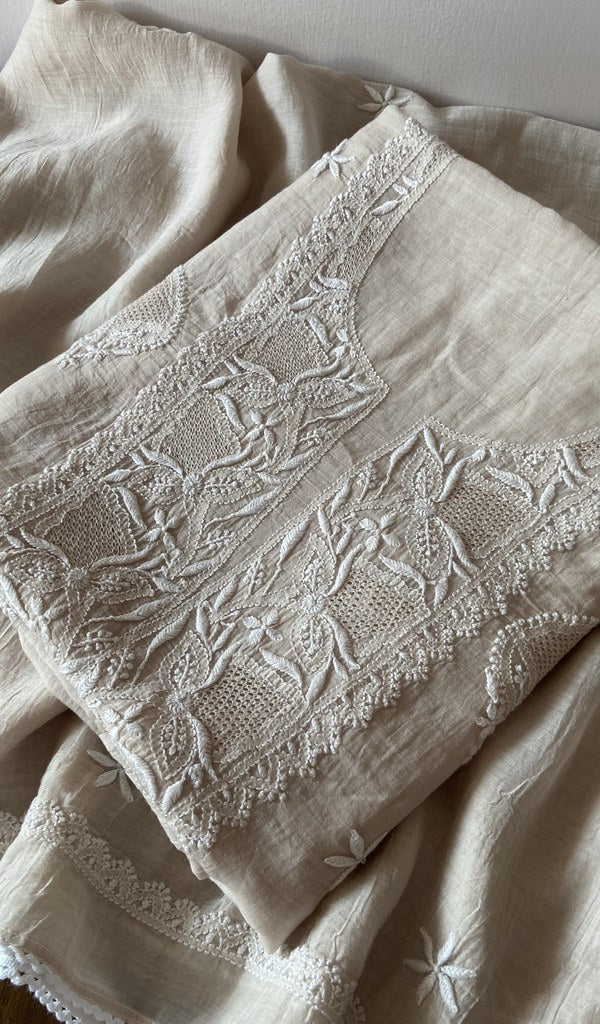 Folded green pure mul chanderi kurta piece with chikankari on the panel