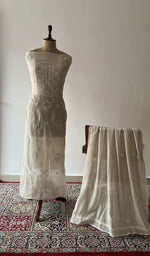 Green pure mul chanderi chikankari suit set on the mannequin with its dupatta