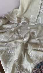 Folded kurta piece and dupatta, chikankari along the hem
