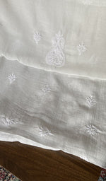 Hem and border of the white dupatta