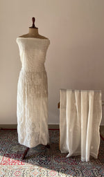 White pure mul chanderi chikankari suit set on the mannequin with its dupatta