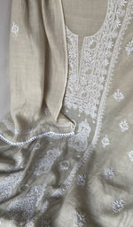Hem and border of the white dupatta