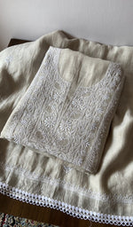 Folded kurta piece and dupatta, chikankari along the hem