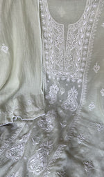 Folded kurta piece and dupatta, chikankari along the hem