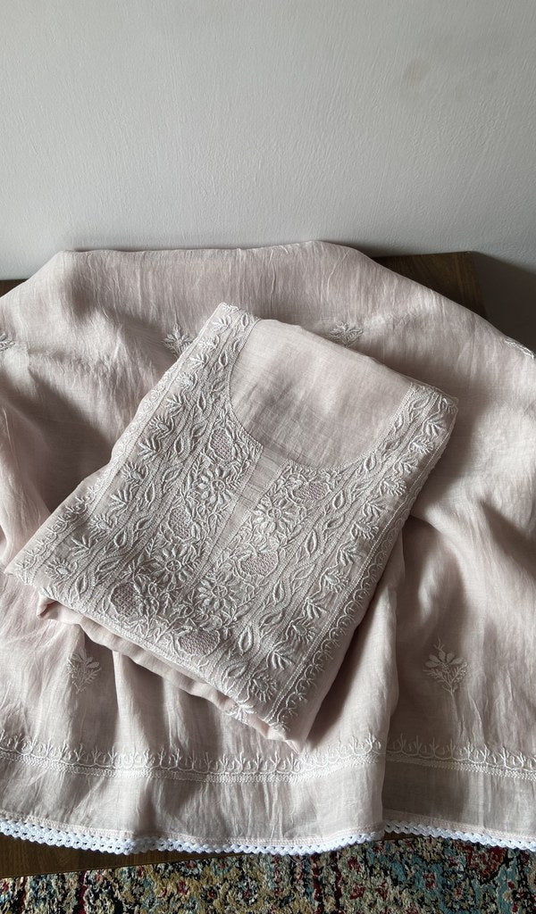 Folded lilac pure mul chanderi kurta piece with chikankari on the panel