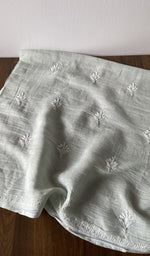 Folded stack, green pure mul chanderi